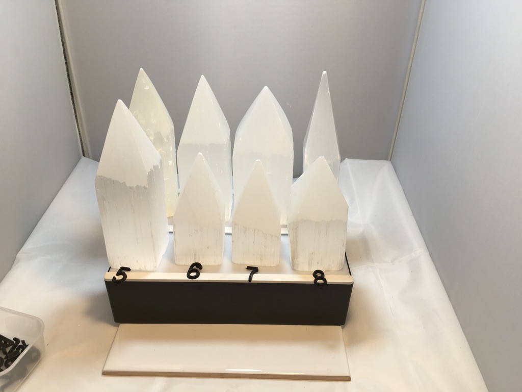 a collection of 8 Selenite pencil points 1-8