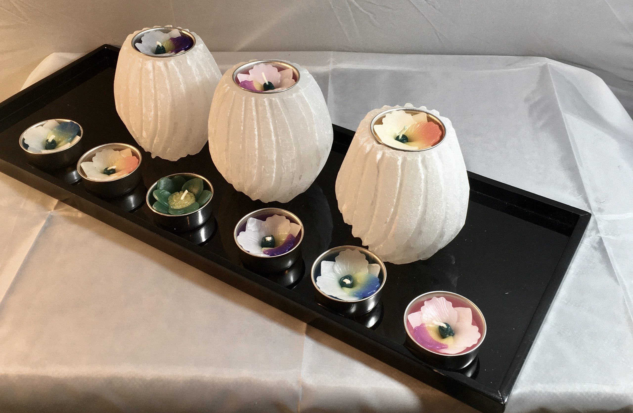 Selenite tealight candle holder glowing with soft spiritual light