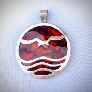 A rare, vintage sterling silver Red Paua pendant — bold, fluid, and completely one-of-a-kind. Handmade over 15 years ago and kept in pristine condition
