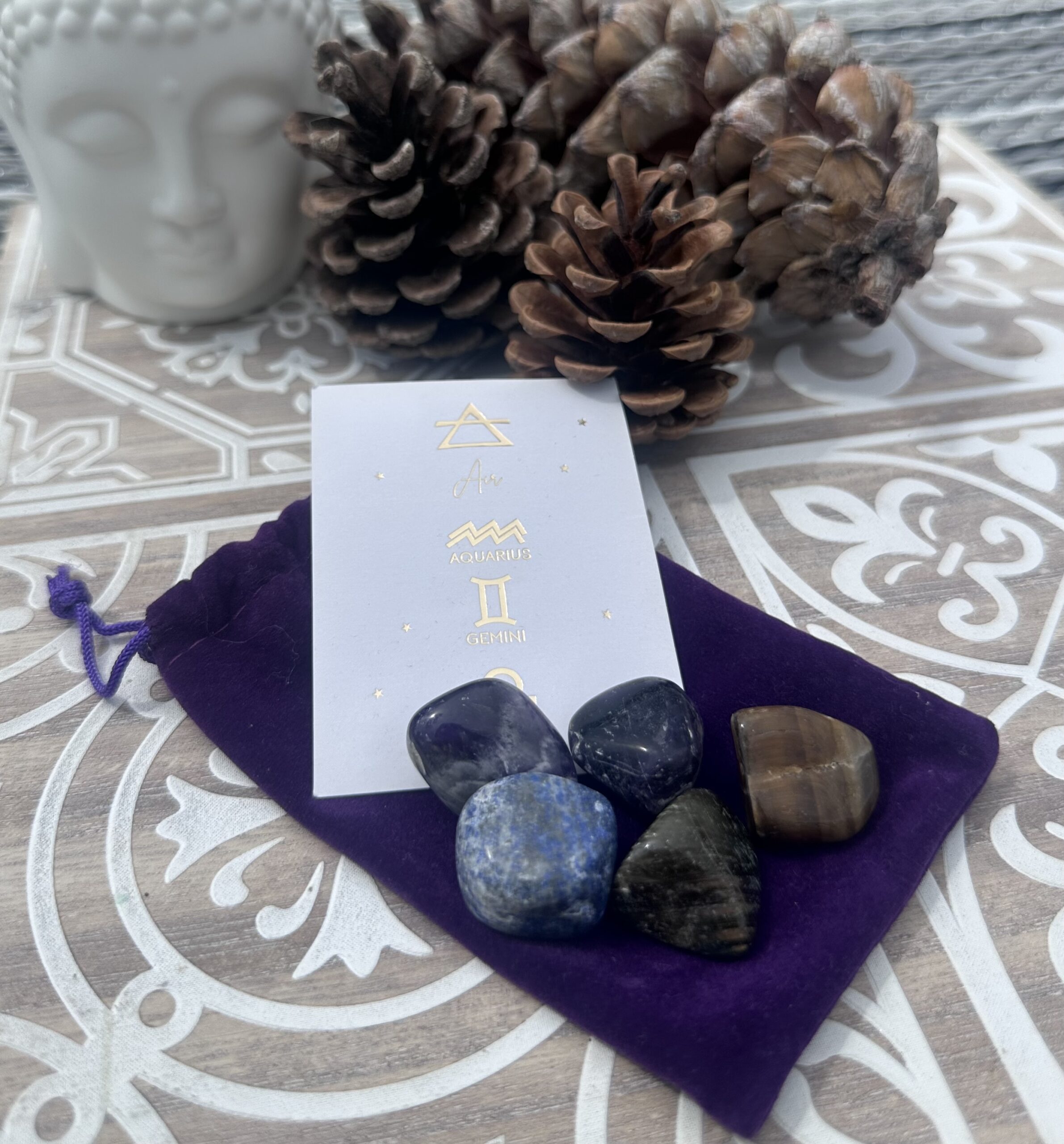 Collection of elemental gemstones inspired by earth, air, fire and water energies