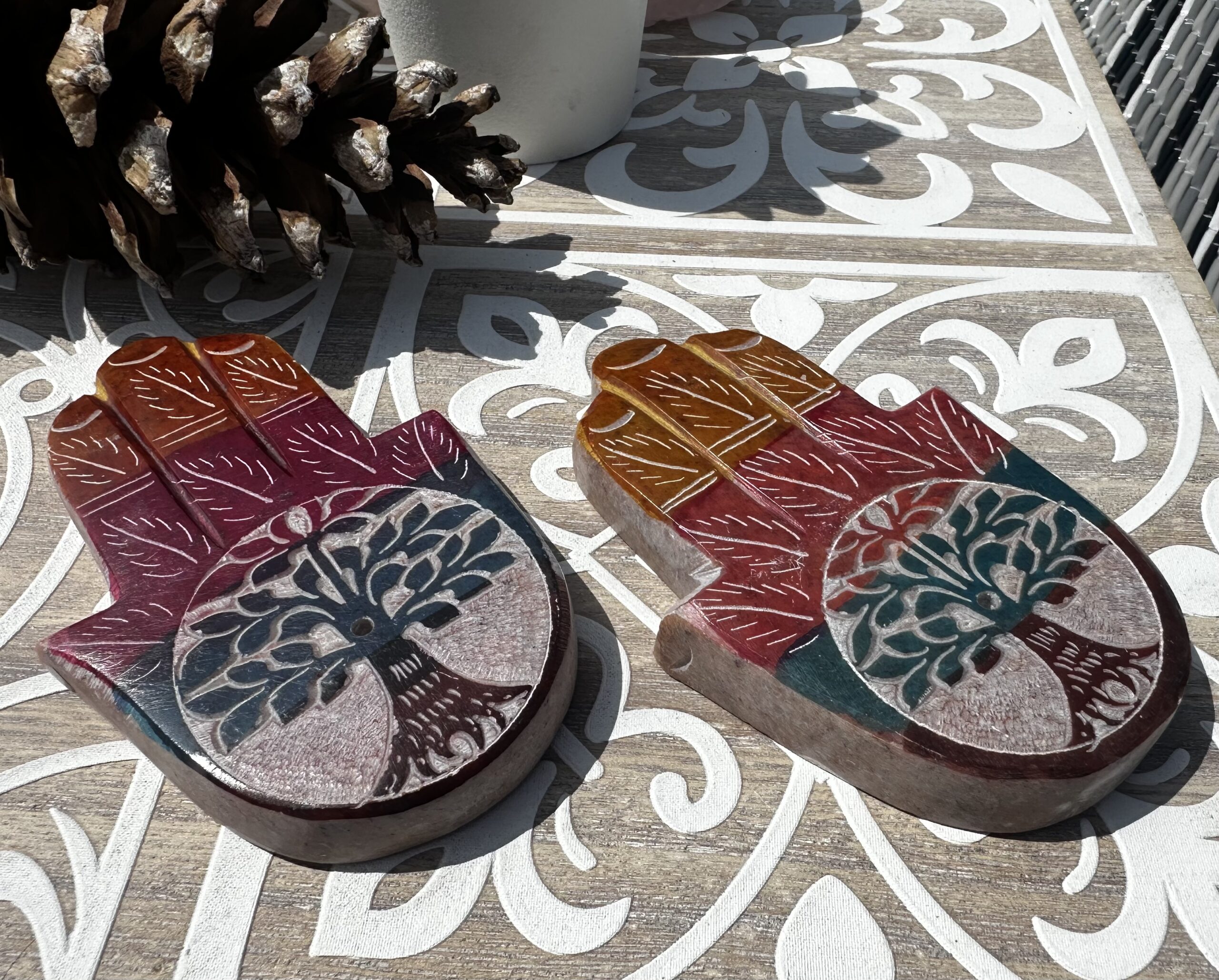 Soapstone incense stick holder shaped like a hand with Tree of Life carving